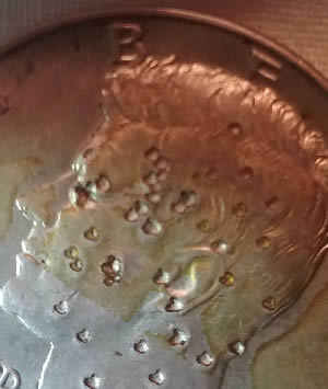 1964-D-Kennedy-Half-Dollar-Looks-Like-Multiple-D-Holes-In-Obverse?what-Is