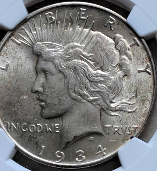 1934-D-Peace-Dollar...you-Vs.-NGC