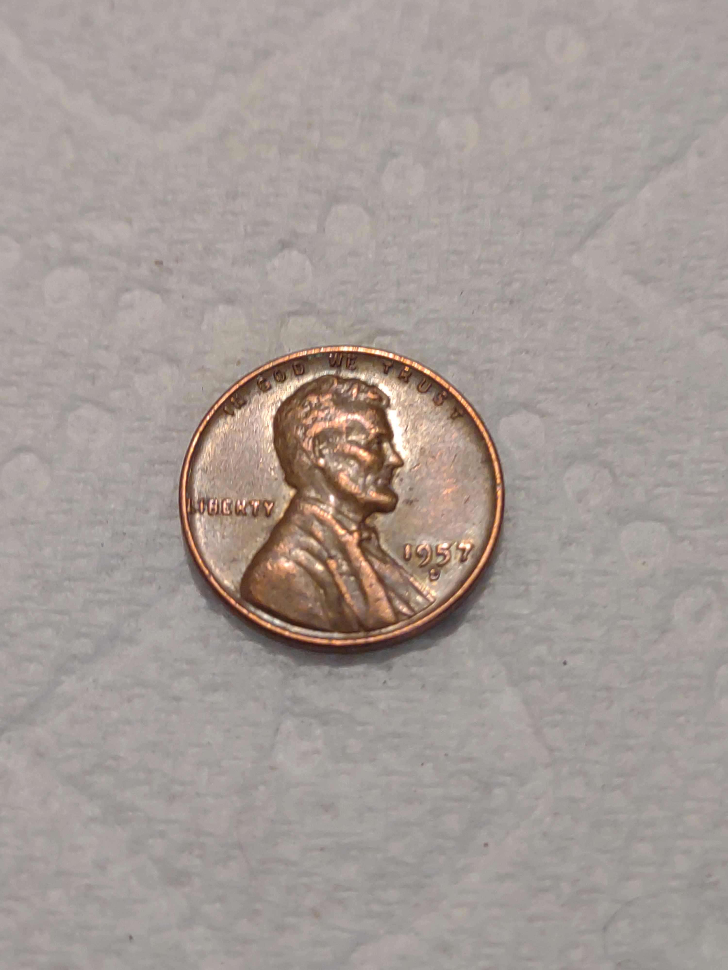 1957-D.-Is-This-RPM-And-OMM-It-Looks-Like-There-Is-S.-Under-The-D-Double-On-Ears?