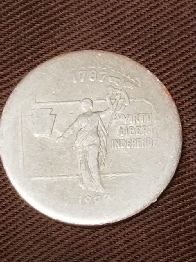 What-Is-Going-On-With-This-1999-PA-State-Quarter?