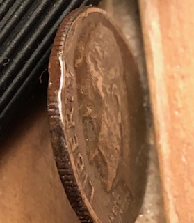 I-Have-A-1977-Dime-That-Has-Clips-On-Both-Sides