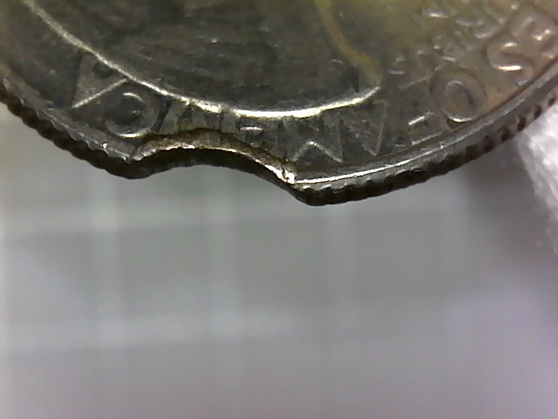 1965-Quarter-Clipped-Or-Cut-Planchet-Two-Places
