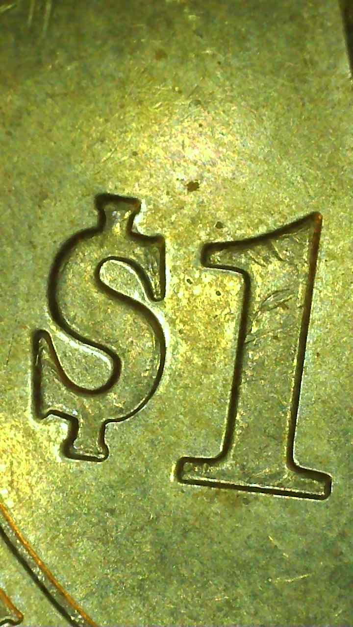 Line-Struck-Through-The-'$'-On-Reverse-Of-'07-Madison-Presidential-Dollar
