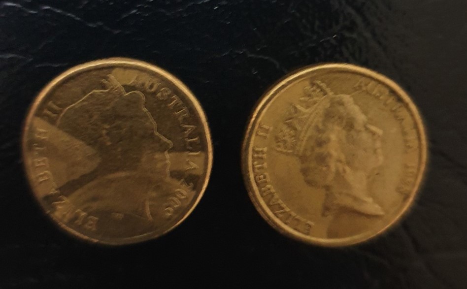 Need-Help-With-Two-$2-Dollar-Coins-With-Marks-On-Back.