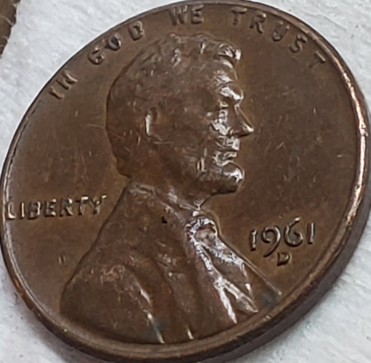 1961-D-Lincoln-Memorial-Cent,-Extra-Strip-Running-Down-East-Side-Of-Bust?