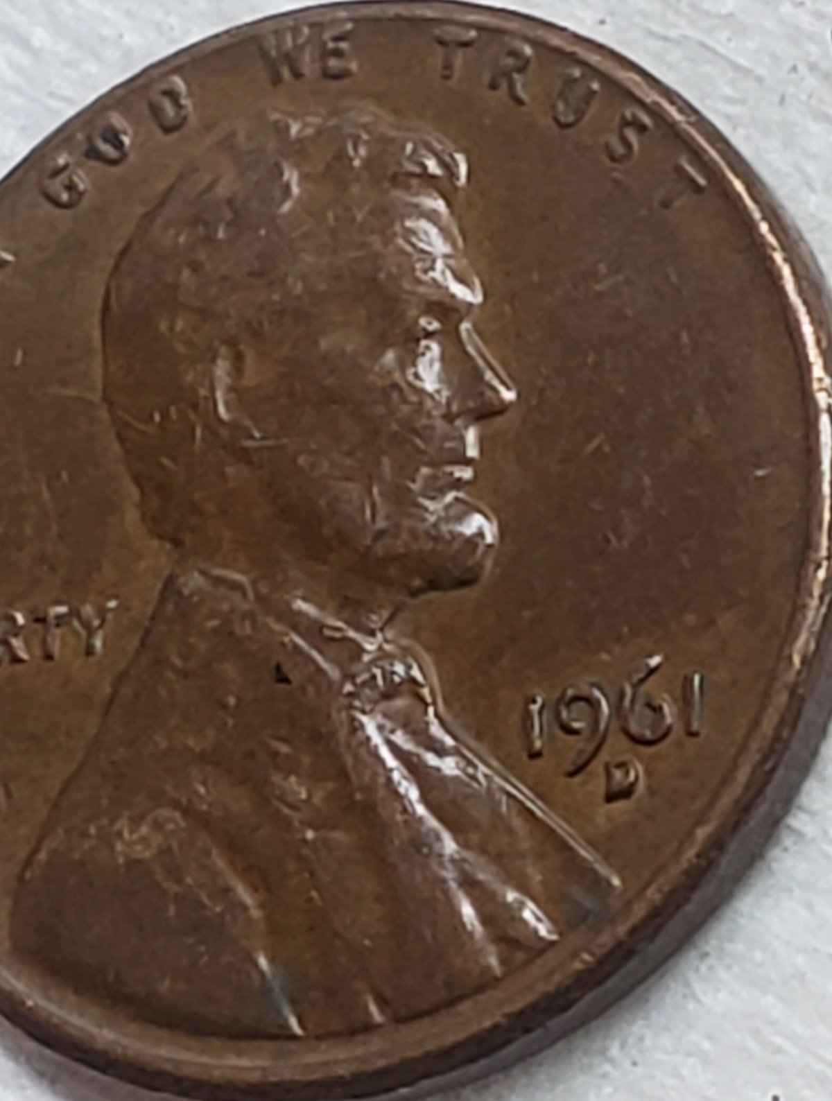 1961-D-Lincoln-Memorial-Cent,-Extra-Strip-Running-Down-East-Side-Of-Bust?