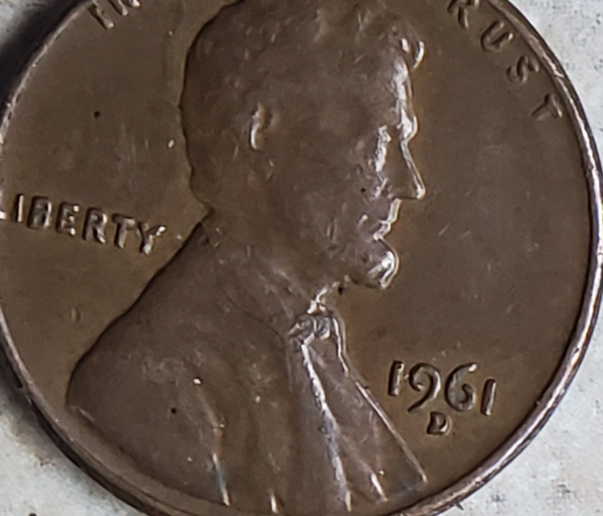 1961-D-Lincoln-Memorial-Cent,-Extra-Strip-Running-Down-East-Side-Of-Bust?