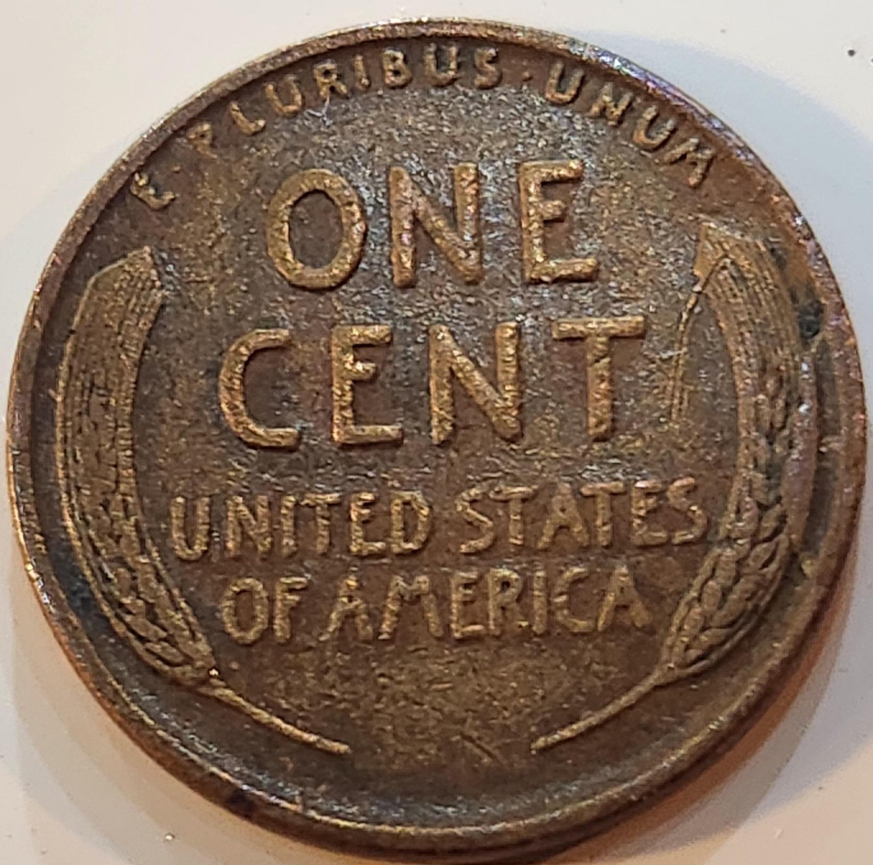 What's-The-Numismatic-Term-For-What's-Happening-On-The-Right-Wheat-Stalk-On-This-1936-P-LWC?