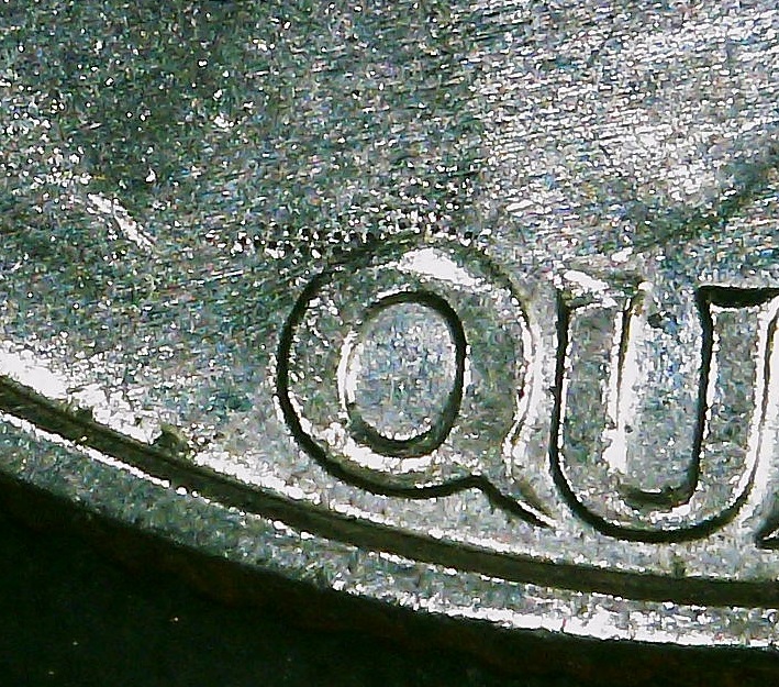 1987-D-Quarter-With-Crazy-Strike-Through