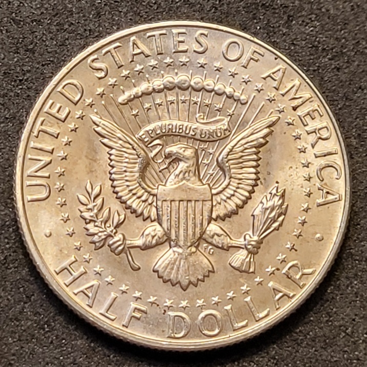 1968-D-Kennedy-Half-Dollar-With-MD-And-Something-Else.