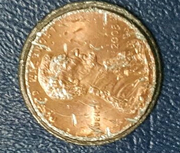Strange-Nickel-Sized-1987-LMC