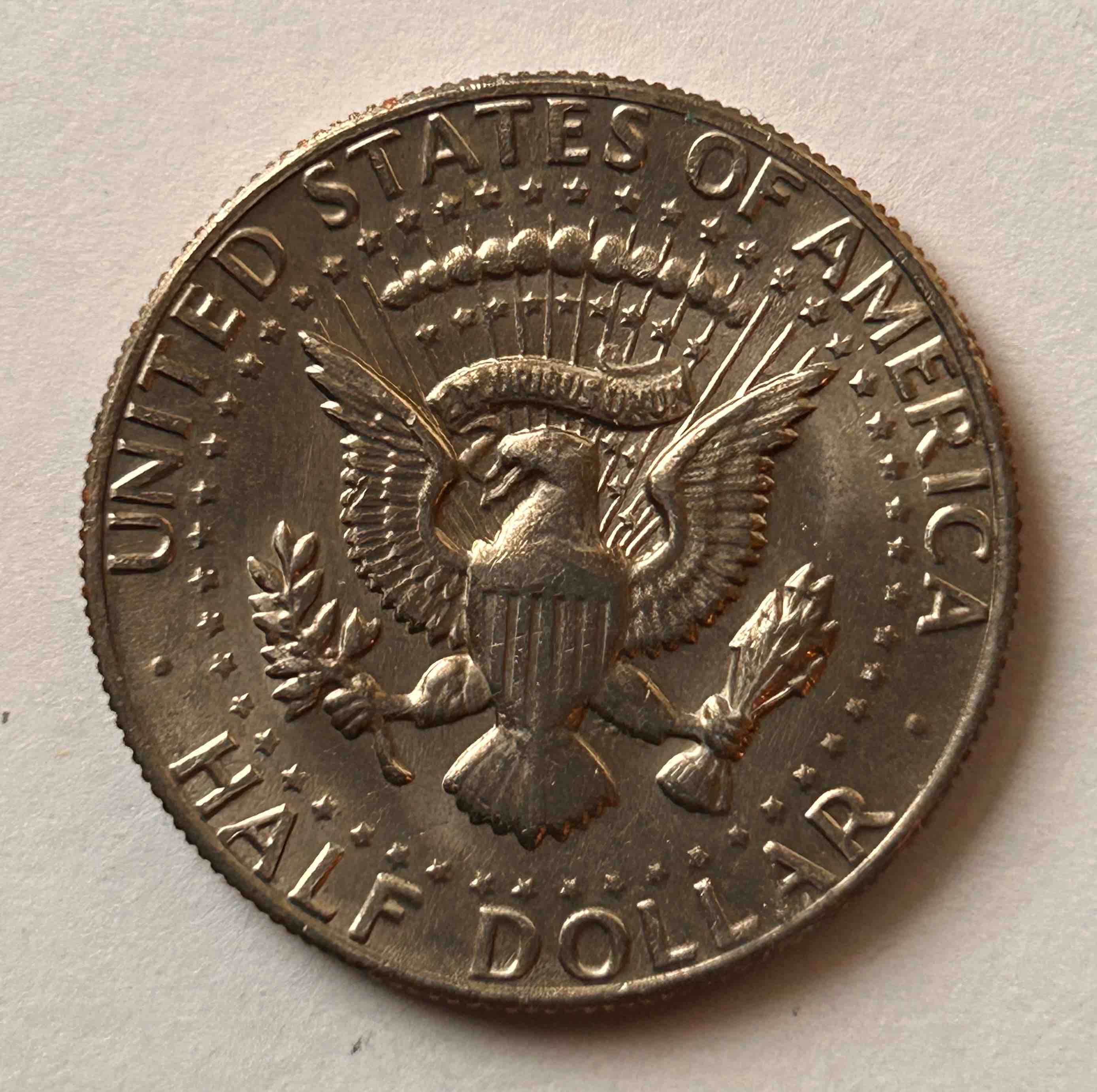 1982-P-Mint-Kennedy-Half-Dollar.-Part-Of-E-Missing-In-Liberty.
