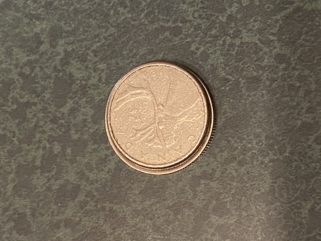1981-Quarter-Struck-On-Nickle-Planchet?