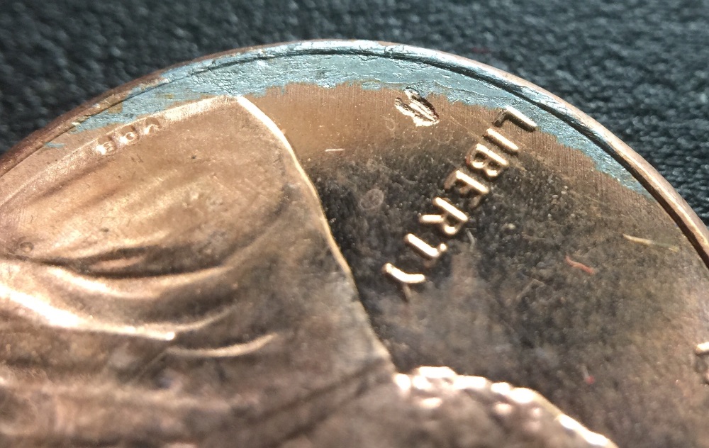 2014-Shield-Cent-Struck-Through-Damaged-Planchet
