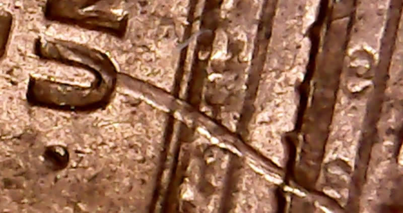1993-D-LMC-Possible-Struck-Through-String-Or-Something