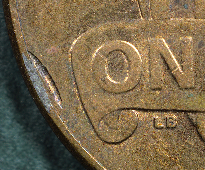 2011-D-1c-Struck-Through-Rim-Burr