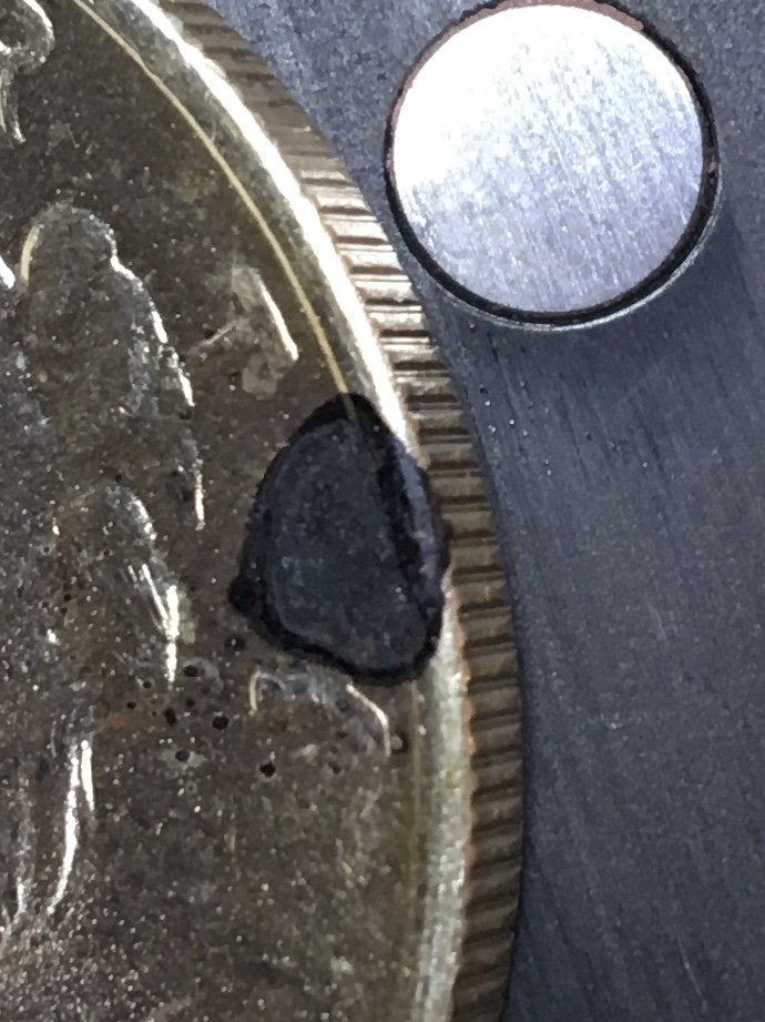 Help-Identifying-Stain-On-Gem-Peace-Dollar---Updated-Pics