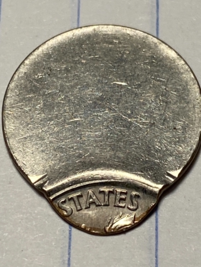 First-Heavy-Off-Center-Strike-Dime