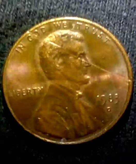 1983-D-Penny,-Damage-That-Flows-With-As-If-Cast,-Gouge-Across-Face