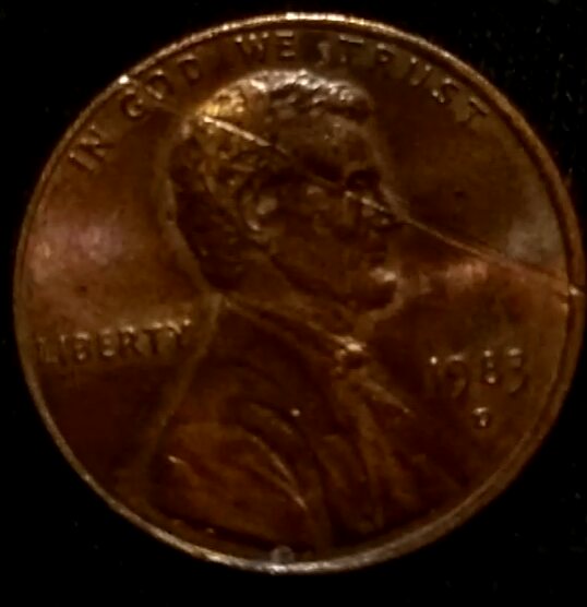 1983-D-Penny,-Damage-That-Flows-With-As-If-Cast,-Gouge-Across-Face