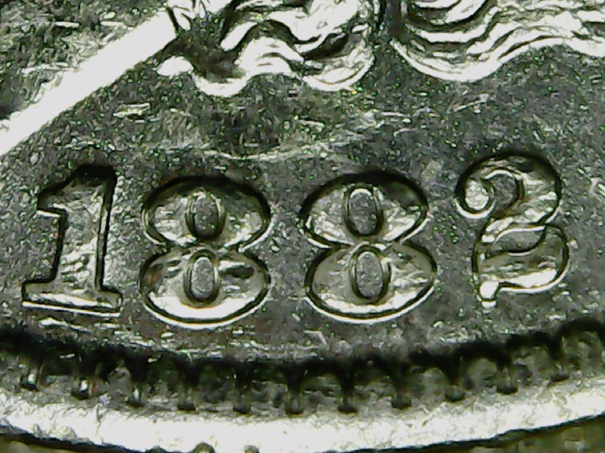 1982-O-Morgan-Dollar-Help-Please.-The-Reverse-Has-More-Of-Whatever-This-Is.