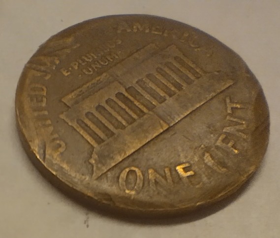 1959?-Penny-Not-Sure-If-Error,-Clipped-Or-Just-Damaged.