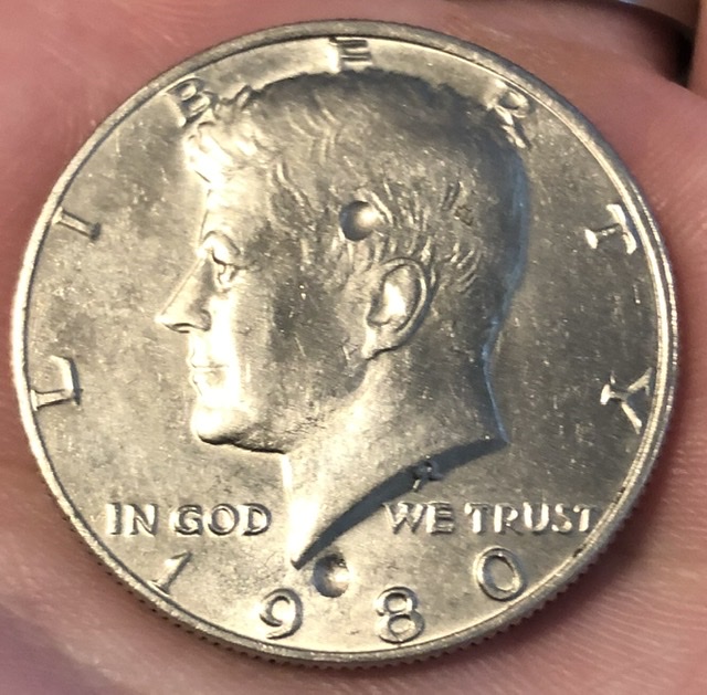 1980-D?-Kennedy-Half-Dollar-With-Strange-Smooth-Dents.-Error-Or-PMD?