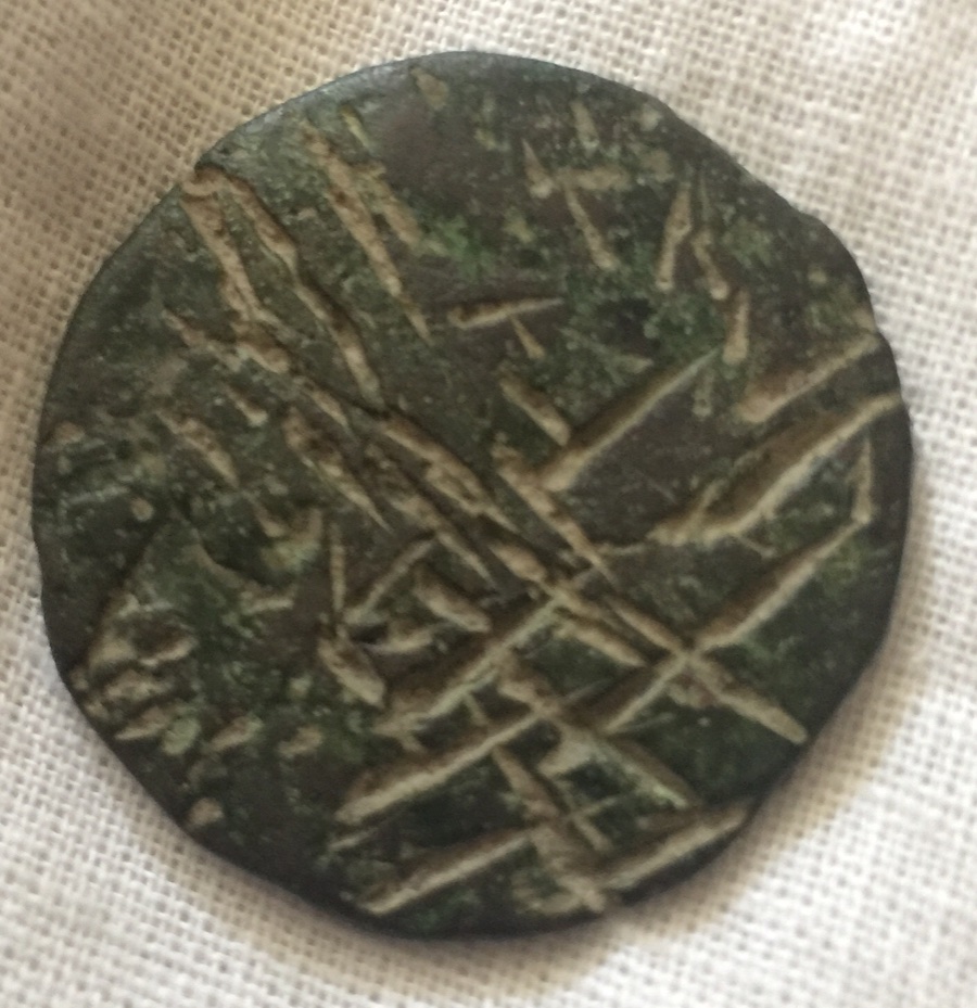 Strange-Looking-Coin-With-Line-Markings