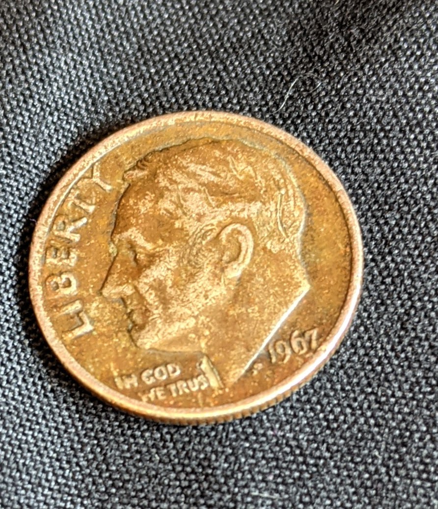 1967-Dime,-Is-This-Damaged-Or-A-Mint-Error?