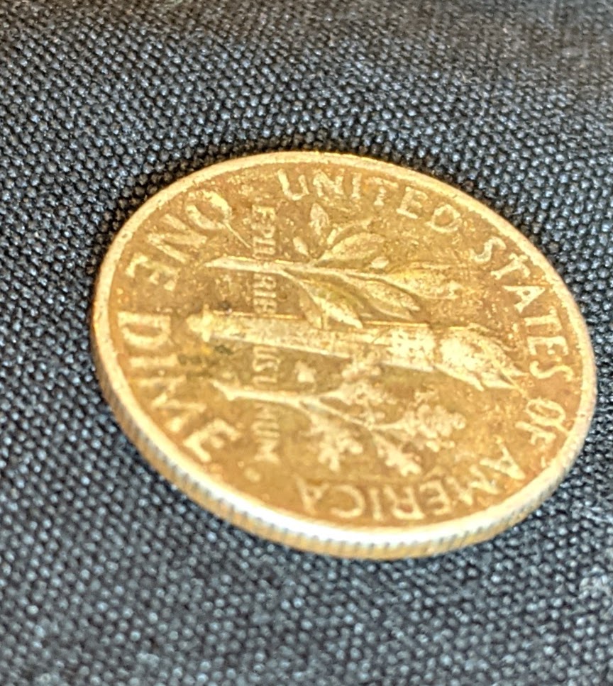 1967-Dime,-Is-This-Damaged-Or-A-Mint-Error?
