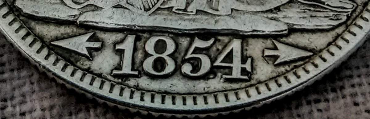 1854-Half-Dollar-O-.-Unsure-Of-The-Grade-/-Value