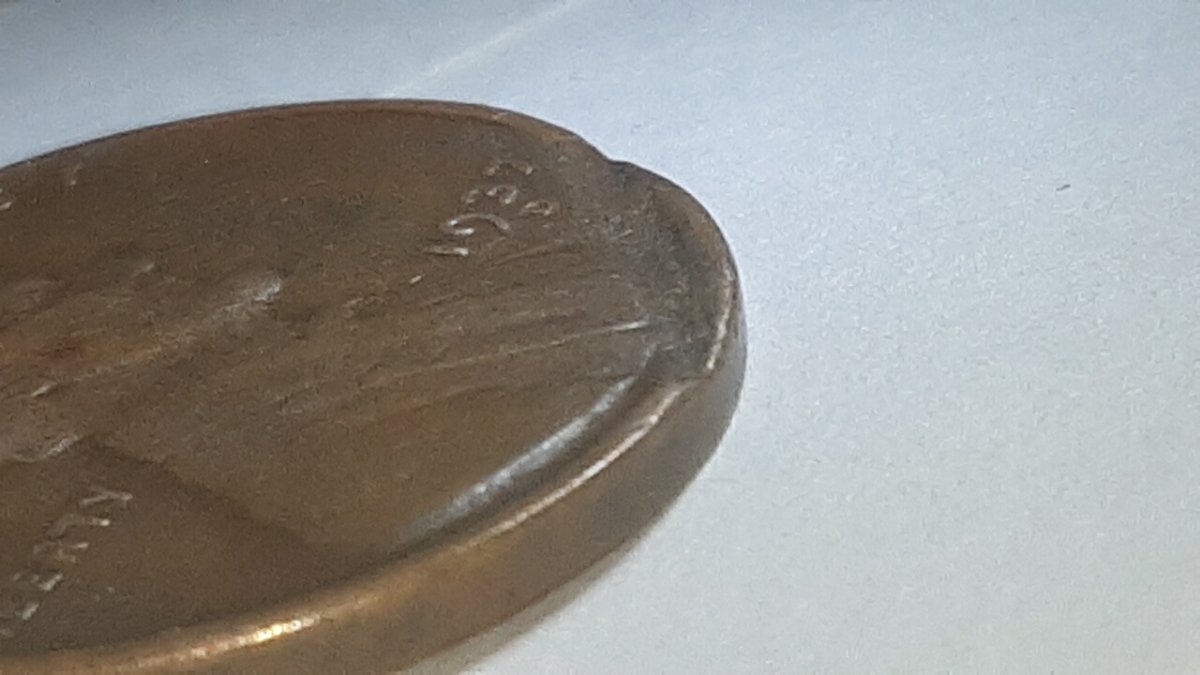 1937-D-Penny-With-Some-Kinda-Indent.-Need-Help