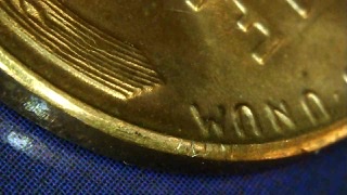 1958-Wheat-Penny-With-Part-Of-Lettering-Stamped-On-Rim/Edge?