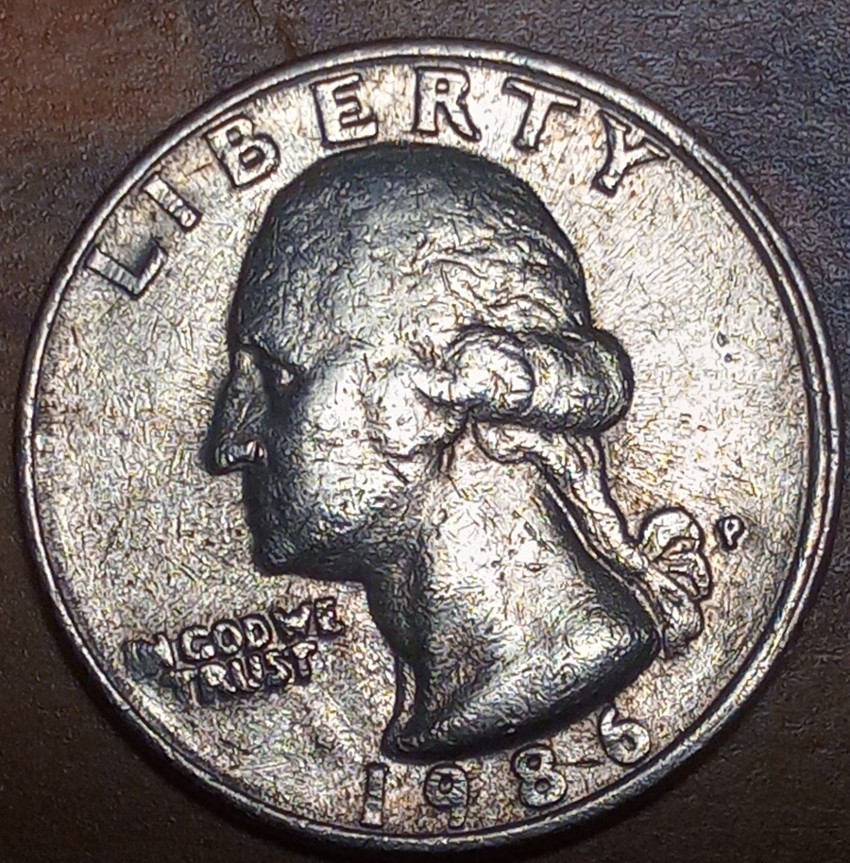 1986-Washington-Quarter-With-A-Die-Chip-Under-United