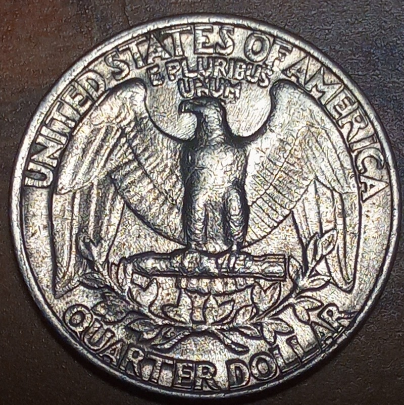 1986-Washington-Quarter-With-A-Die-Chip-Under-United