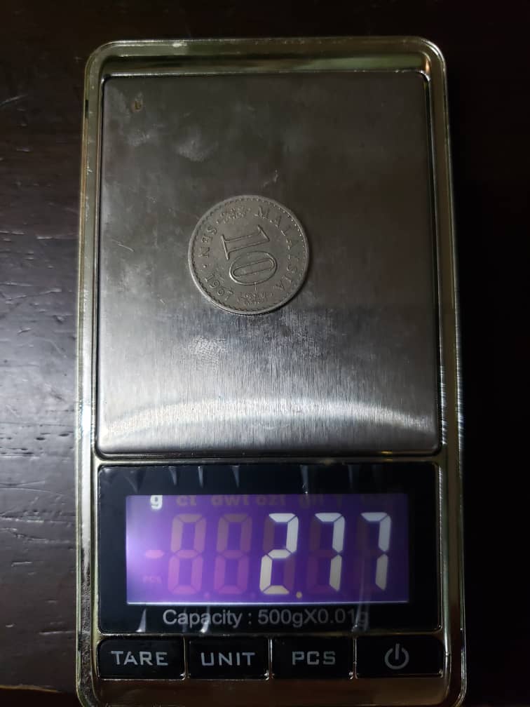 Is-This-Coin-Wrongly-Placed-Into-A-Pure-100-%-Nickel-Planchet?