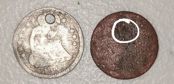 Unidentifiable-Coin-Found-In-NY-River