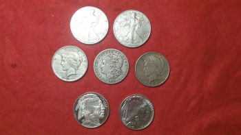Last-Month-I-Sold-A-Raw-Ike-Dollar-For--$150