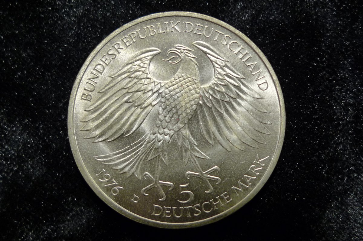 Post-Your-Coins-With-Unusual,-Bizarre,-Or-Eerie-Images