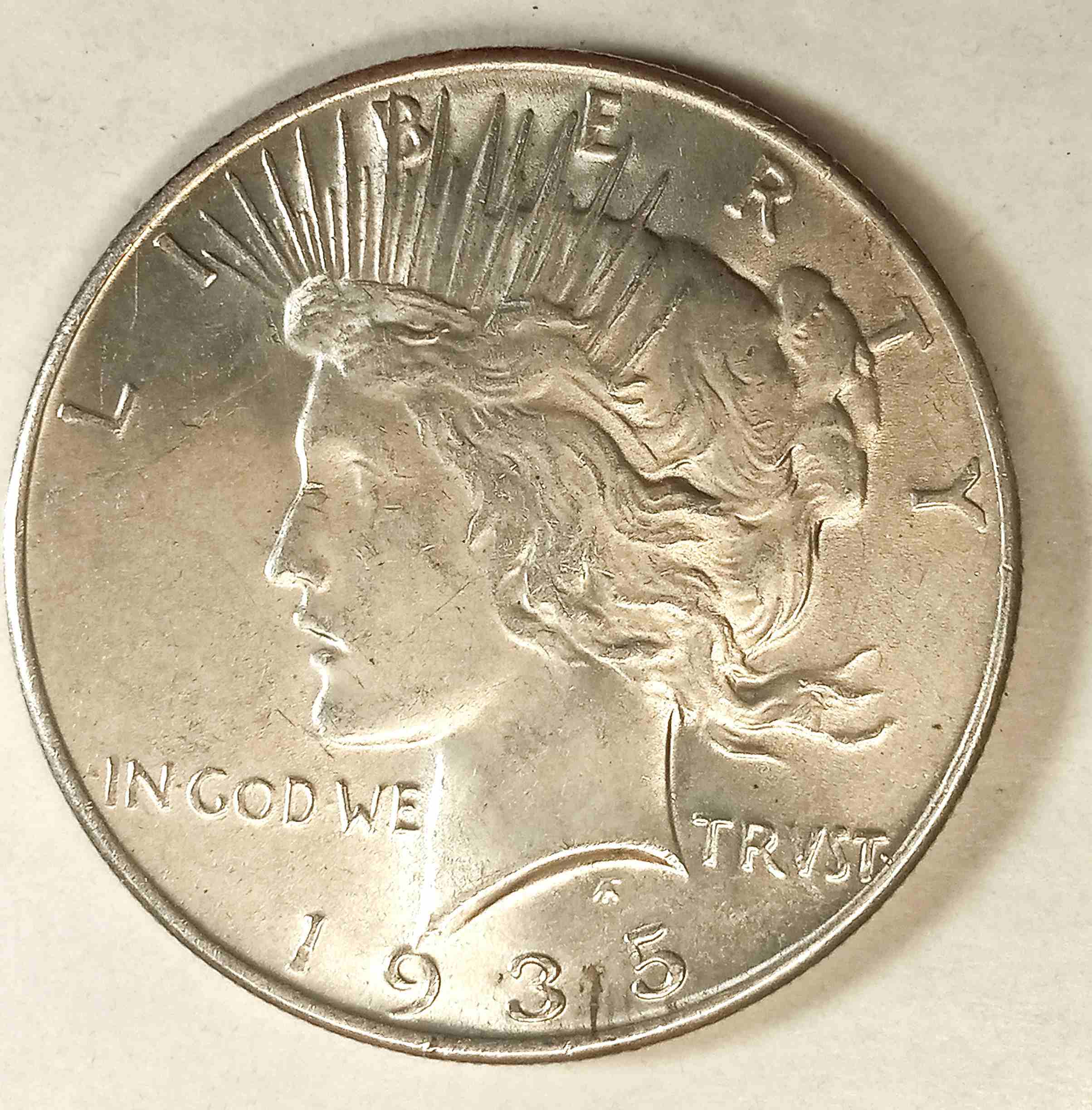 1935-Peace-Dollar-Grade