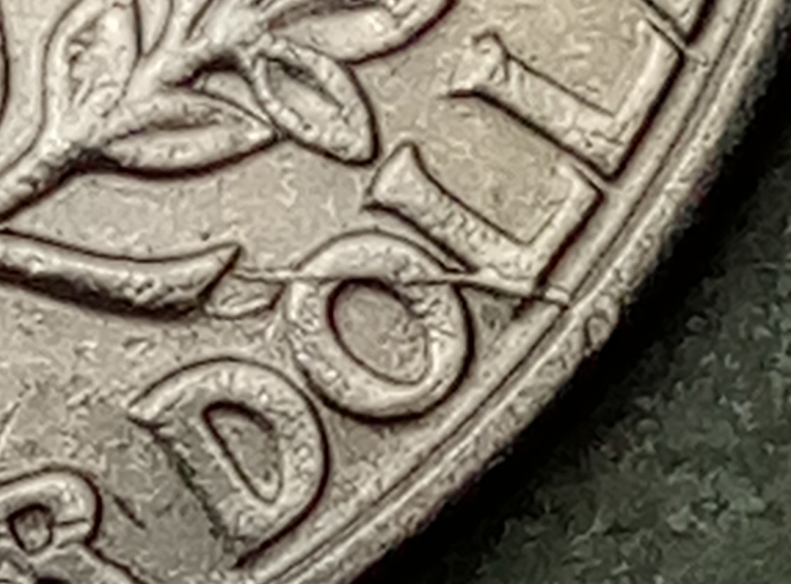 Found-This-1994-P-Quarter.with-Extra-Line-Of-Metal?