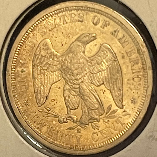 Odd-Observation-On-An-1875-S-20-Cent-Piece