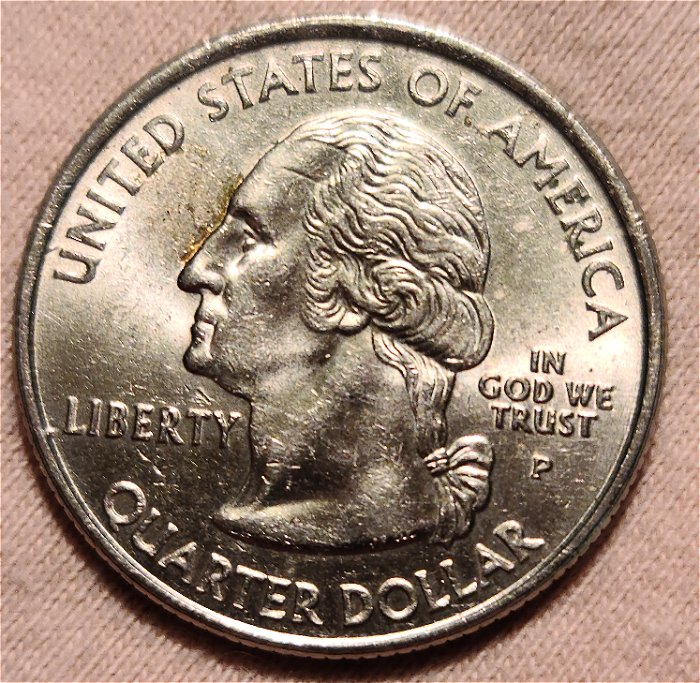 What-Causes-The-Copper-Color-On-The-Rim-Of-Quarter-To-Turn-Black?