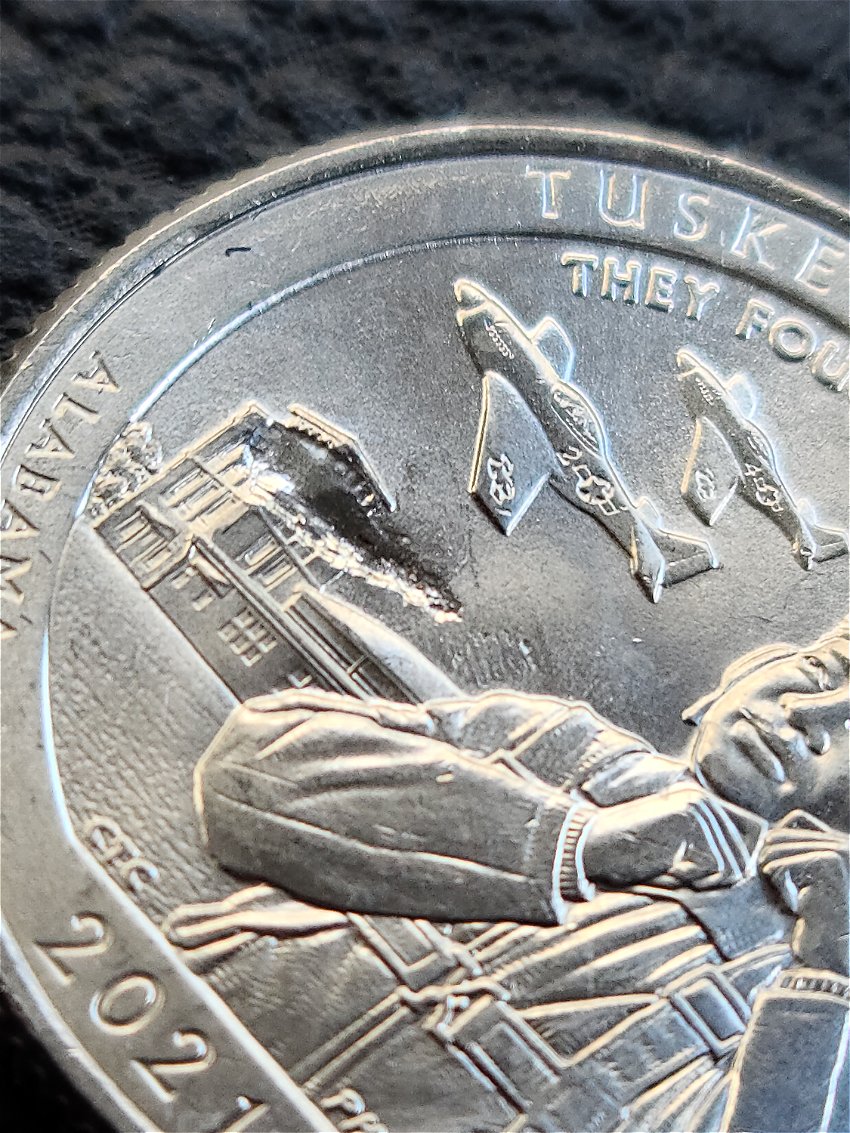 Two-2021-P-Tuskegee-Airmen-Quarter-Struck-Through