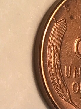 1957-Cud-Error-Wheat-Penny.--Any-Additional-Value,-Or-Not?