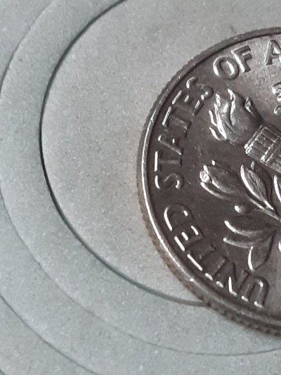 2021-P-Dime-Looks-Like-It-Has-An-Die-Chip-That-Looks-Like-A-Leaf