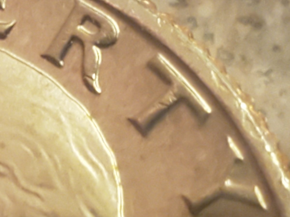 1977-D-Quarter.-Is-This-Doubling-On-The-Wing-Lines-And-R-In-Liberty?