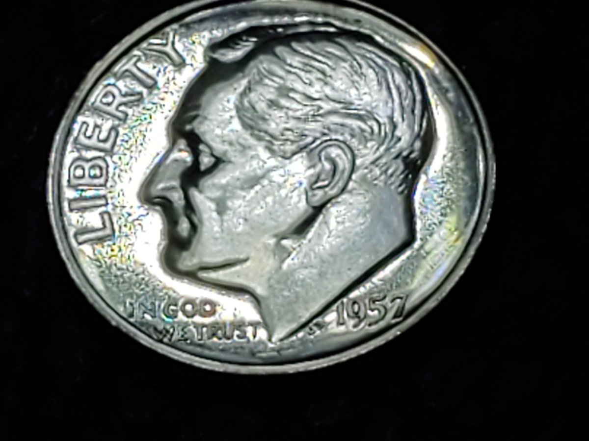 1957-Proof-Dime.-Curious-Of-Grade,-Full-Torch,-Worth-Sending-Off?
