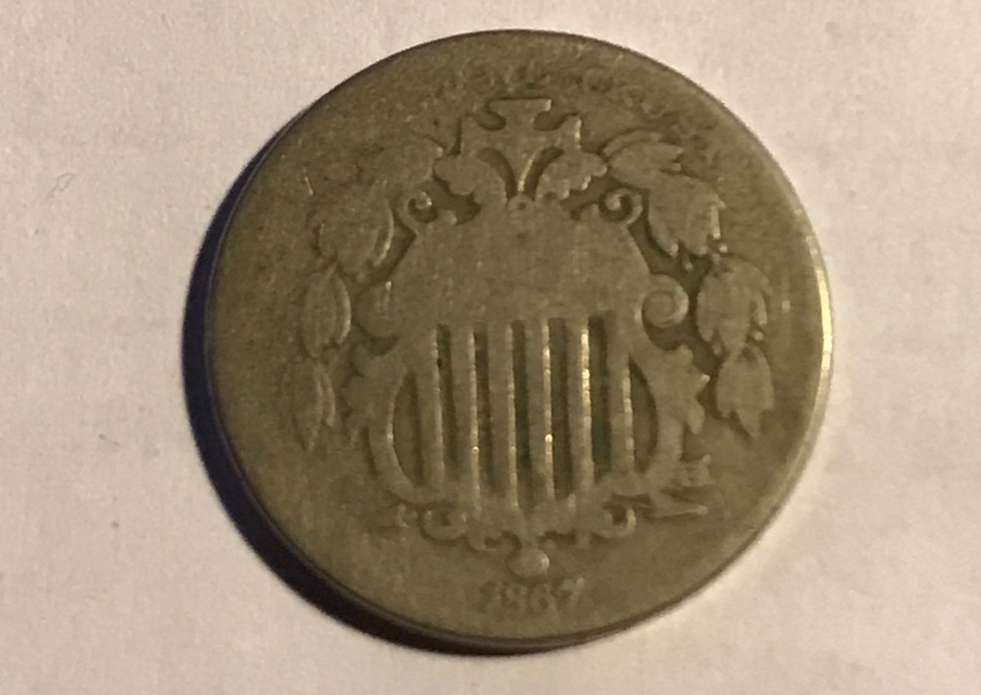 1867-Shield-Nickel-On-Different-Planchet-?