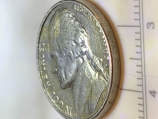 Hey-I-Found-A-Magician-Coin-,-Is-It-Worth-Something-Has-Two-Different-Mints